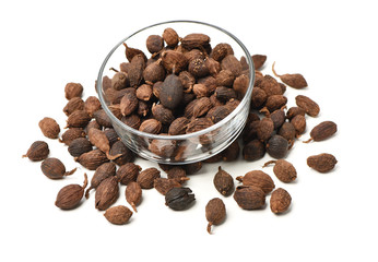 Black cardamom on a white background 