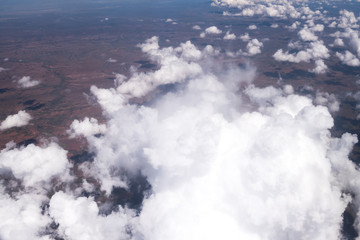 Low puffy clouds while flying into La Paz, Bolivia, South America