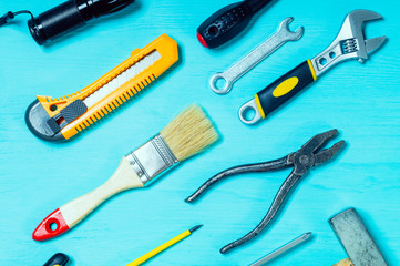 the tools lie tilted on a wooden background