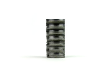 Silver coins stack on white background