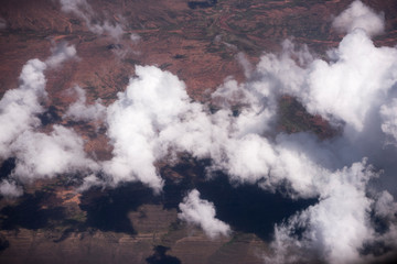 Low puffy clouds while flying into La Paz, Bolivia, South America