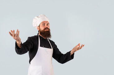 Chef ready to cooking new dish. Chief cook and professional culinary. Male cook in chef hat. Chef, cook or baker man. Bearded man chef in uniform. Bearded man in kitchen apron. Professional cook man.