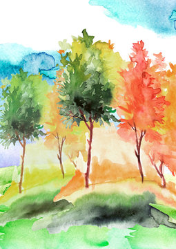 Watercolor autumn trees of yellow, red, orange color. Autumn forest,hill, blue sky. Watercolor art background.Beautiful splash of paint. Abstract creative background.