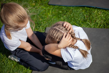 The child goes in for sports in the fresh air. Sports exercises for children. Training before the competition. Children's sports are the key to a healthy generation.