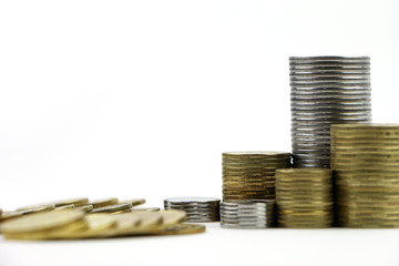 Silver and gold  coins isolated on white background