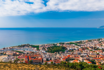 Panoramic sea landscape with Gaeta, Lazio, Italy. Scenic historical town with old buildings, ancient churches, nice sand beach and clear blue water. Famous tourist destination in Riviera de Ulisse