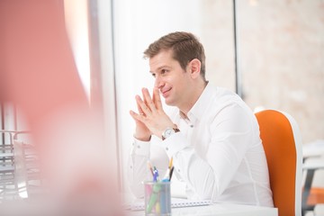 Businessman sitting at office desk