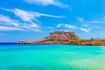 Foto op Plexiglas Sea skyview landscape photo with Feraklos castle near Agia Agathi beach on Rhodes island, Dodecanese, Greece. Panorama with sand beach and clear blue water. Famous tourist destination in South Europe © oleg_p_100