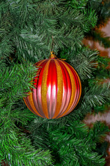 Christmas toys on the Christmas tree. Festive mood.