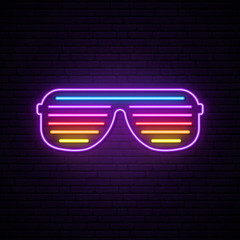 Neon shutter glasses sign. Bright vector sunglasses illustration in retro 80s style. © greens87