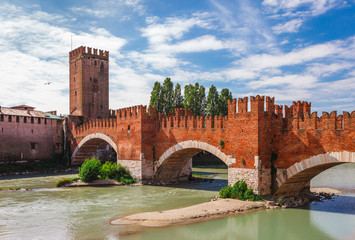 Panoramic cityscape aerial view on Verona historical center, bridge and Adige river. Famous travel...