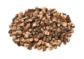 Cinnamon twig chinese herbal medicine on a white background pestle over white background. Gui zhi.