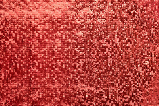 Red metallic Squared three-dimensional background. Shiny metal silver foil texture