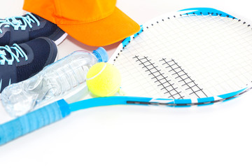 Tennis on a light background. sneakers, tennis racket, ball,