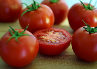 tomatoes on a wooden board