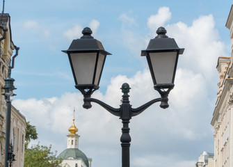 Fototapeta na wymiar lamppost against the sky in the city