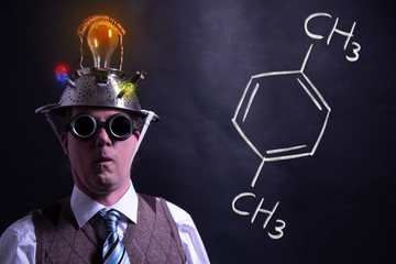 Nerd presenting handdrawn chemical formula of formic Xylene
