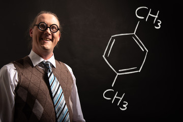 Professor presenting handdrawn chemical formula of Xylene