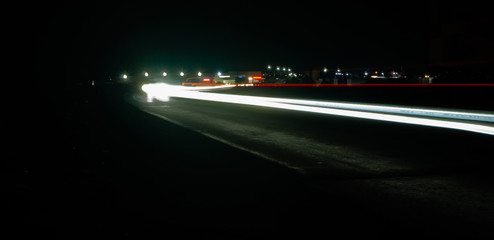Light lines against the background of the night city..