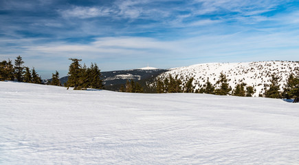 Fototapeta na wymiar Praded, Vysoka hole and Petrovy kameny from Bridlicna hora hill in winter Jeseniky mountains in Czech republic