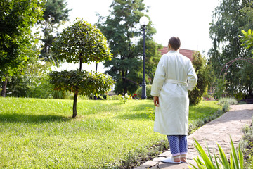 Lonely girl with cancer in a park