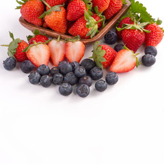 Fototapeta na wymiar A bowl set of beautiful and delicious strawberry and blueberry isolated on white background, close up, copy space, clipping path, cut out.