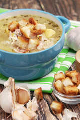 A bowl with traditional Czech garlic soup cesnecka