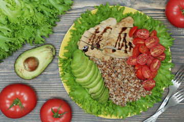 Turkey breast, avocado, salad and buckwheat as healthy lunch