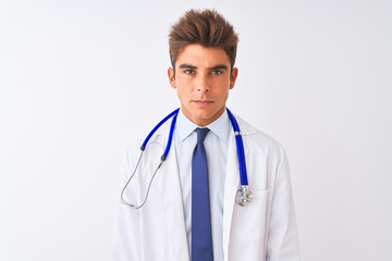 Fototapeta premium Young handsome doctor man wearing stethoscope over isolated white background skeptic and nervous, frowning upset because of problem. Negative person.