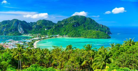 Koh Phi Phi Don, Viewpoint - Paradise bay with white beaches. View from the top of the tropical island over Tonsai Village, Ao Tonsai, Ao Dalum. Krabi Province, Thailand. - obrazy, fototapety, plakaty