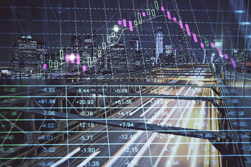 Forex chart on cityscape with tall buildings background multi exposure. Financial research concept.