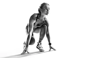 Poster Sports background. Runner on the start. Black and white image isolated on white. © vitaliy_melnik