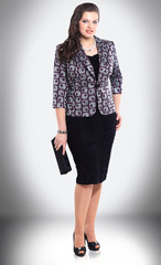 in full growth. elegant young woman with handbag.
