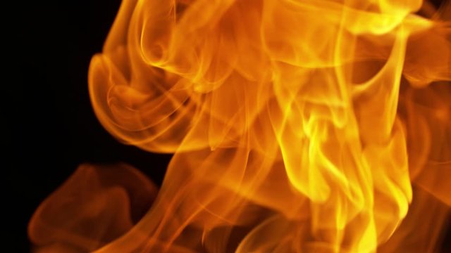 Super slow motion of flames isolated on black background in detail. Filmed on high speed cinema camera, 1000 fps