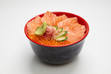 Salmon donburi or slice raw salmon put on cooked rice.