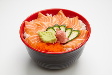 Salmon donburi or slice raw salmon put on cooked rice.