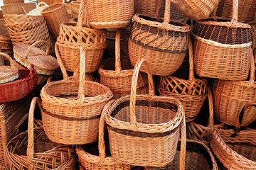 stack of traditional eco wicker baskets background
