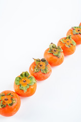 Fresh fruit red persimmon on white background