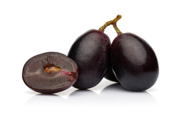 Fresh black grape isolated on white background