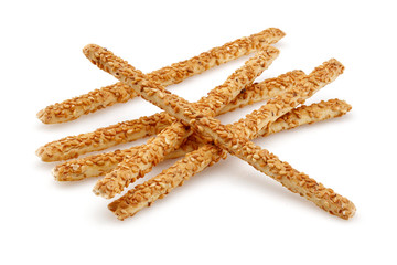 Sesame stick crackers or grissini isolated on white background