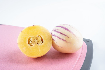 Fresh fruit ginseng cut on red cutting board