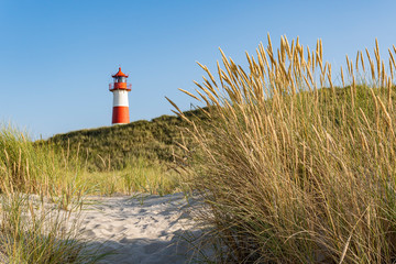 Beautiful Lighthouse List-Ost in sunset light - A Lighthouse on the island Sylt, Germany 