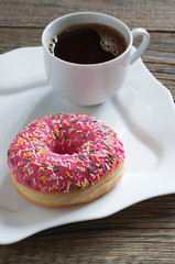 Pink donut and coffee