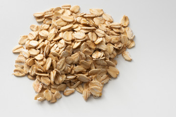 Pile of oatmeal. Isolated. On white background.