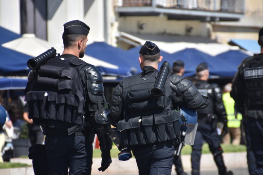 French gendarmes patrol the city during a demonstration
