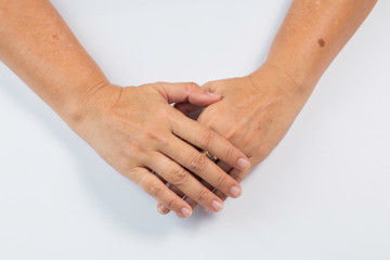 Close up senior woman hand clasp and thinking or consideration on white background
