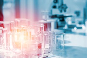 Glass beakers of various sizes in a science laboratory Used for adding chemical fluids to experiment About doing research for science