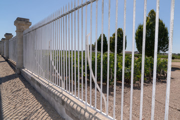 castle property barrier in Margaux castle vineyard of Bordeaux french vine