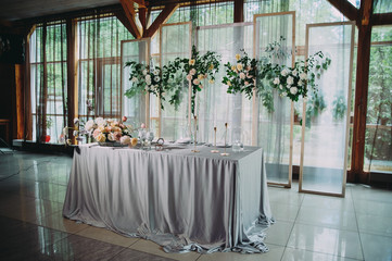 Head table for the newlyweds at the wedding hall.