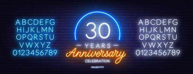 30th anniversary celebration neon sign on dark background. Neon alphabet . Template for invitation or greeting card.